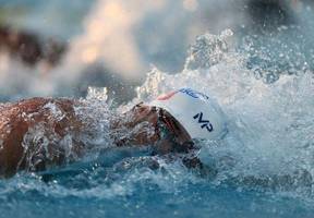 Phelps caps comeback meet with storming 100m free win